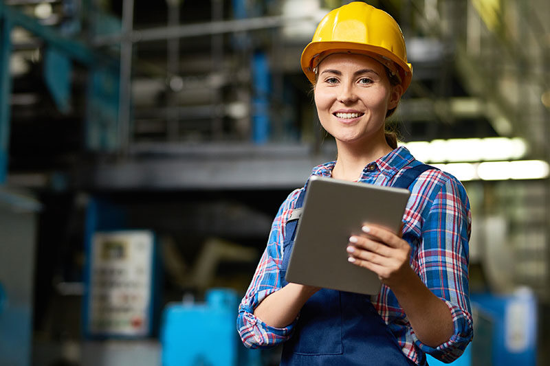Female construction forewoman yellow hat
