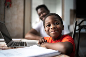 adorable boy computer classroom