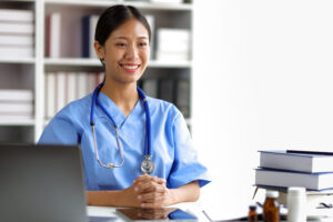 medical professional at desk