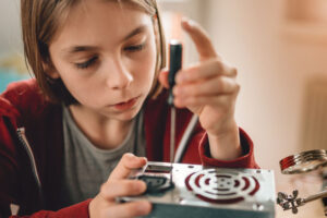 young girl working in STEM