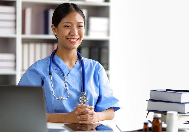 medical professional at desk