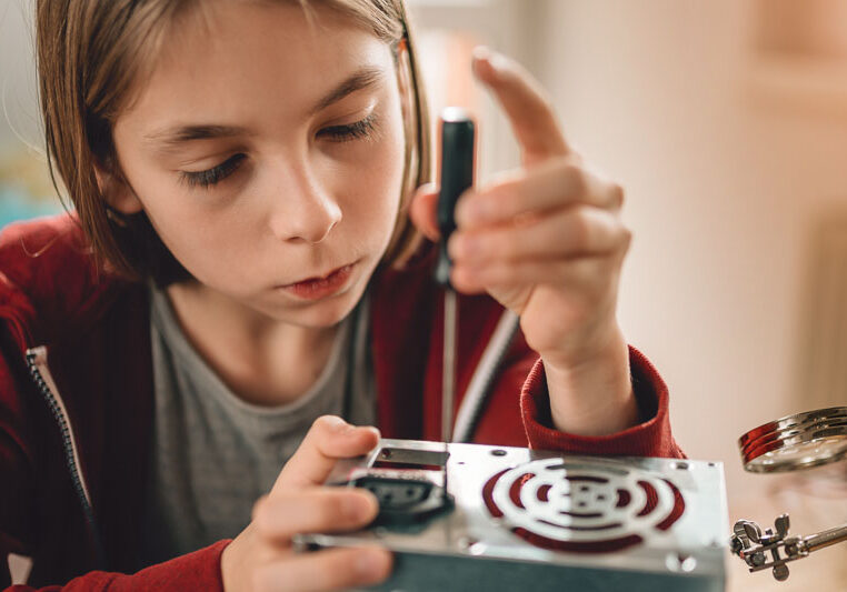 young girl working in STEM